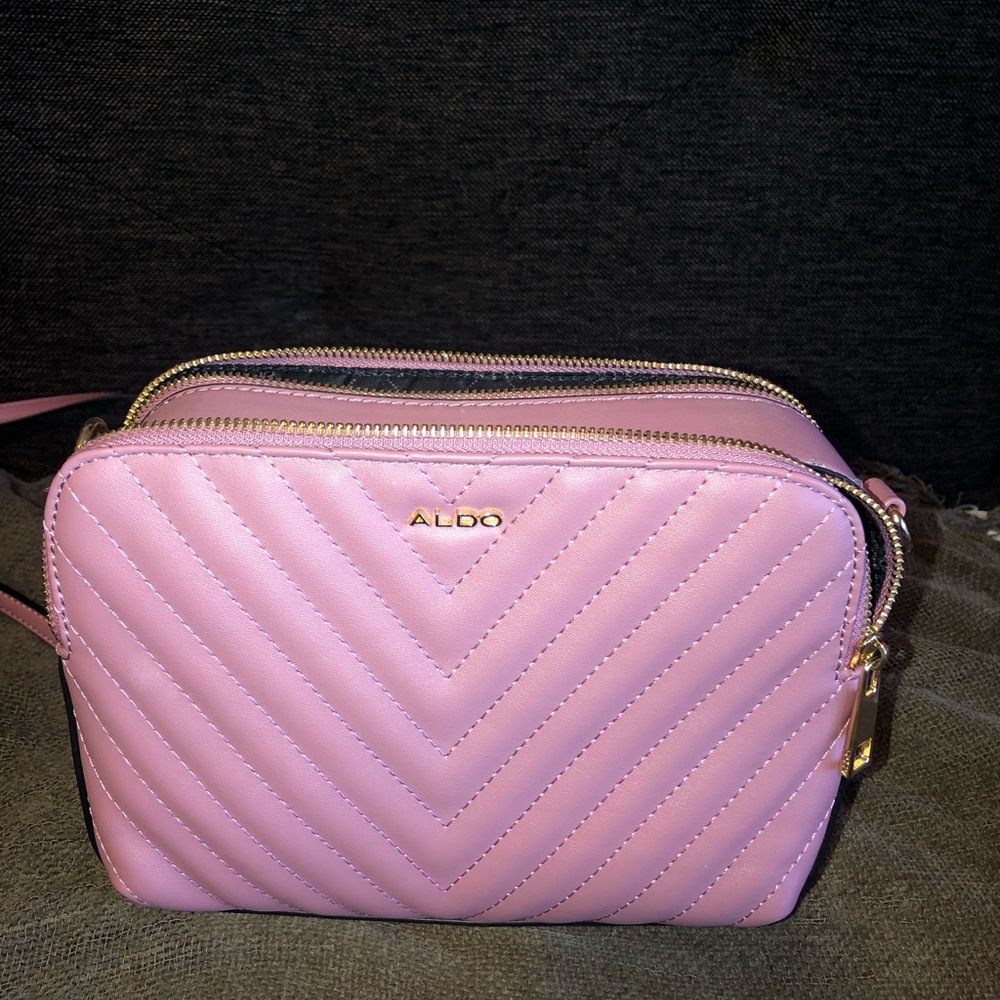 Aldo light pink crossbody bag.